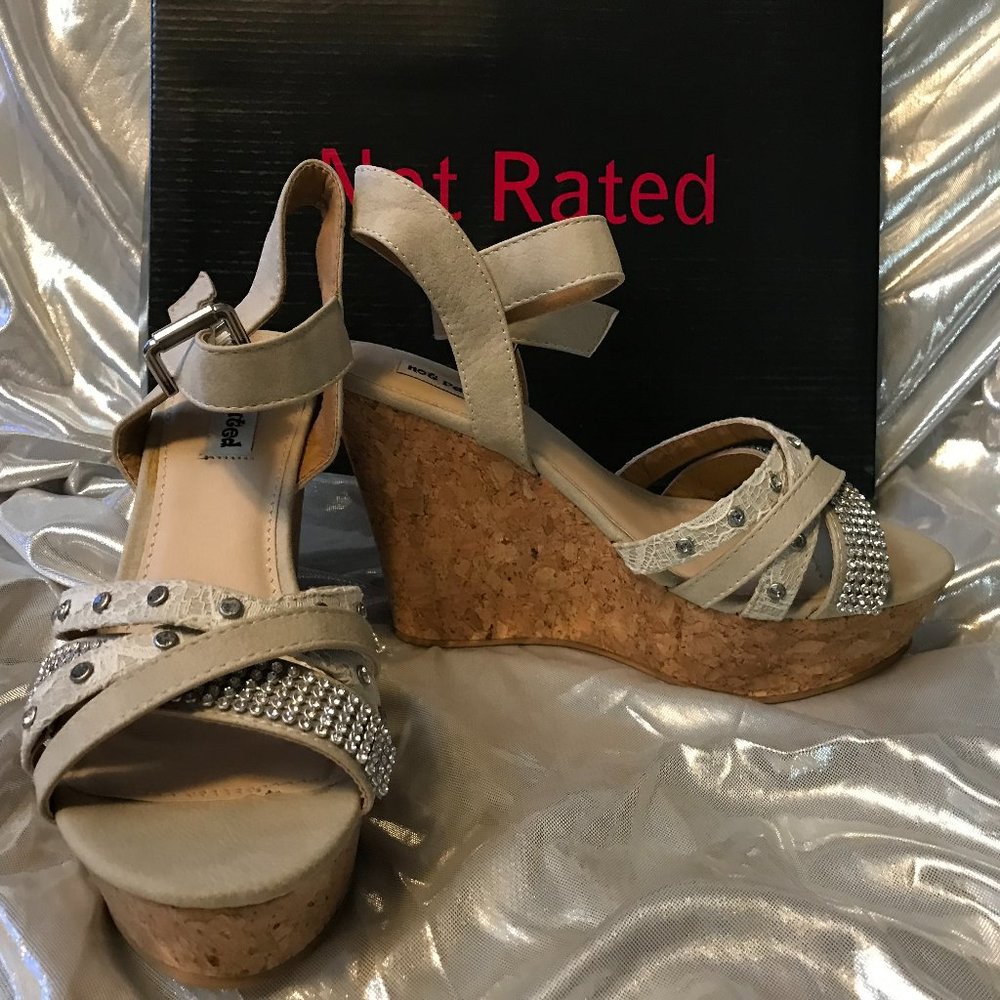 Not Rated  strappy high wedge size 7